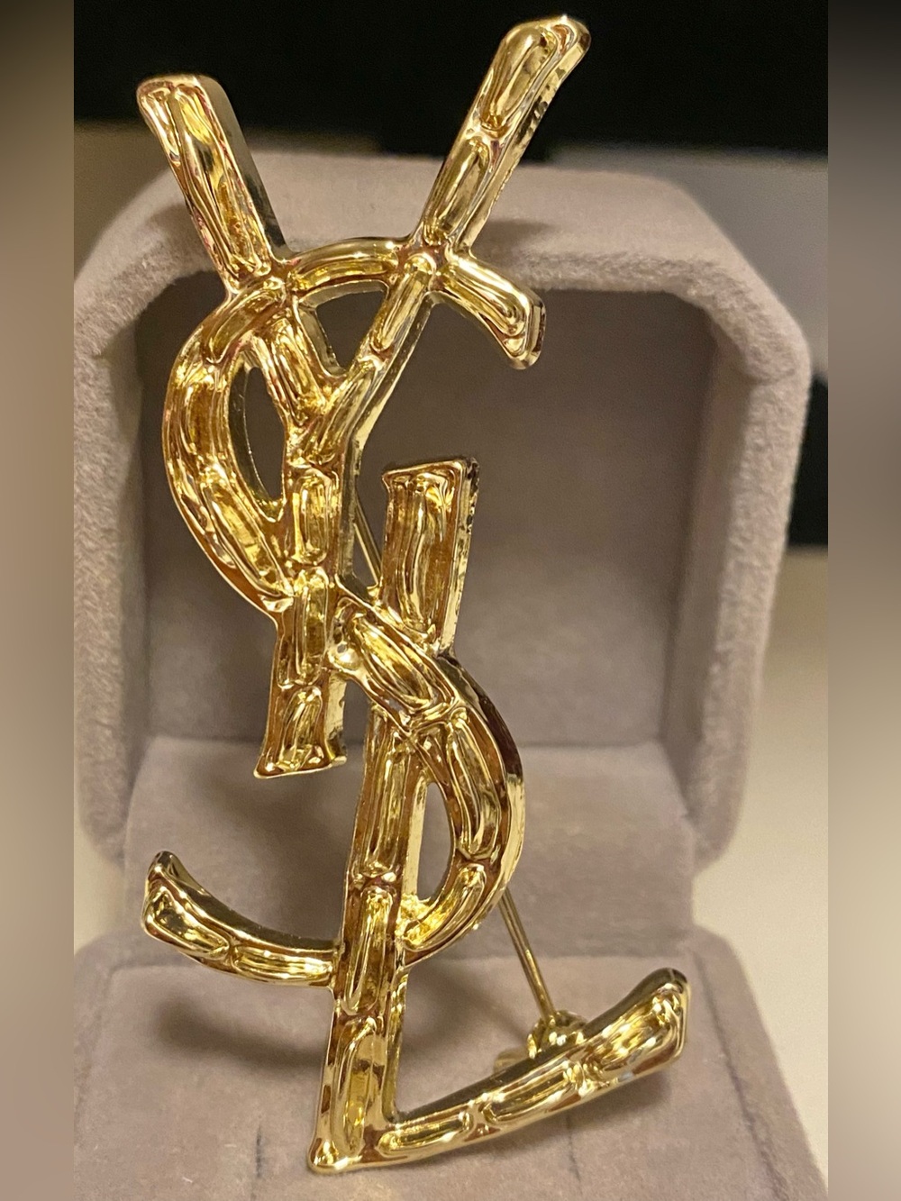 Yves Saint Laurent Gold Toned Logo Brooch unisex